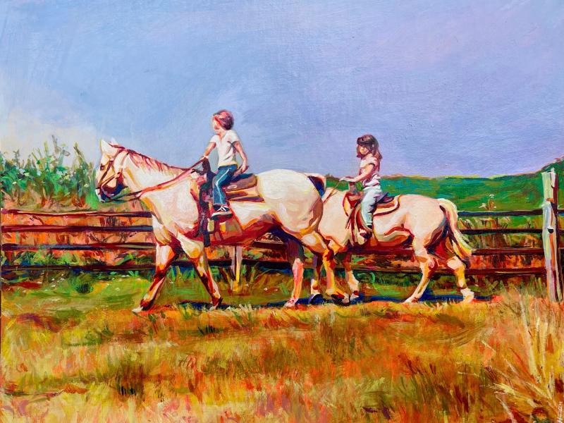 Two little girls from afar on white horses. And older girl is leading in the front. The landscape around them is colorful and dry, like a dessert. 
