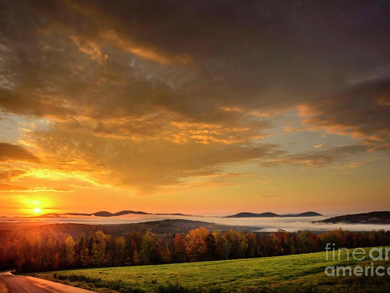 October Sunrise is a view from Phillips, Maine