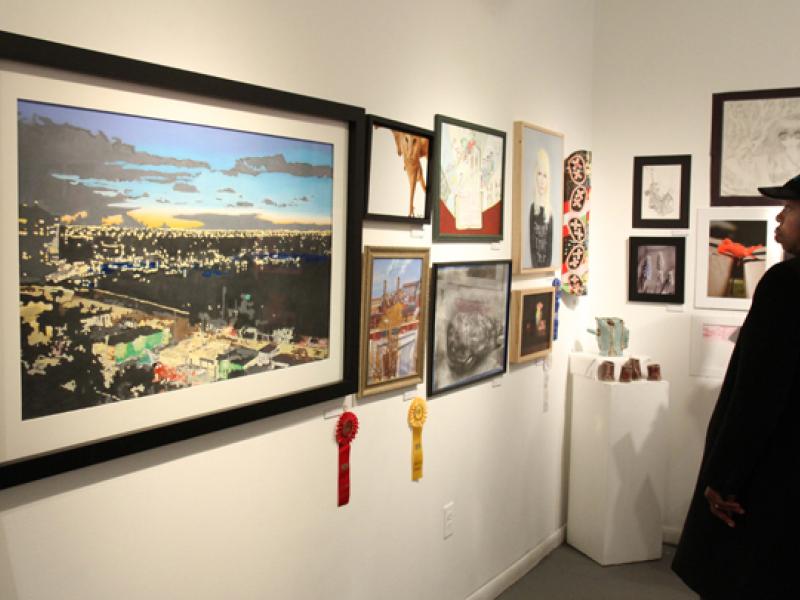 16th Annual Exhibit Admiring all the art on the walls of the Arts Collinswood Gallery