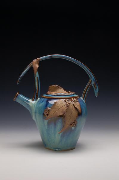Teapot with meditation rattle