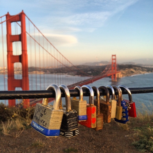 Love locks passing by with a hug and a kiss to San Francisco Bay