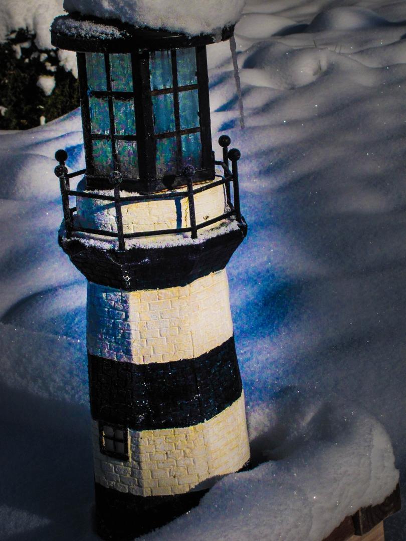 lighthouse in April snow
