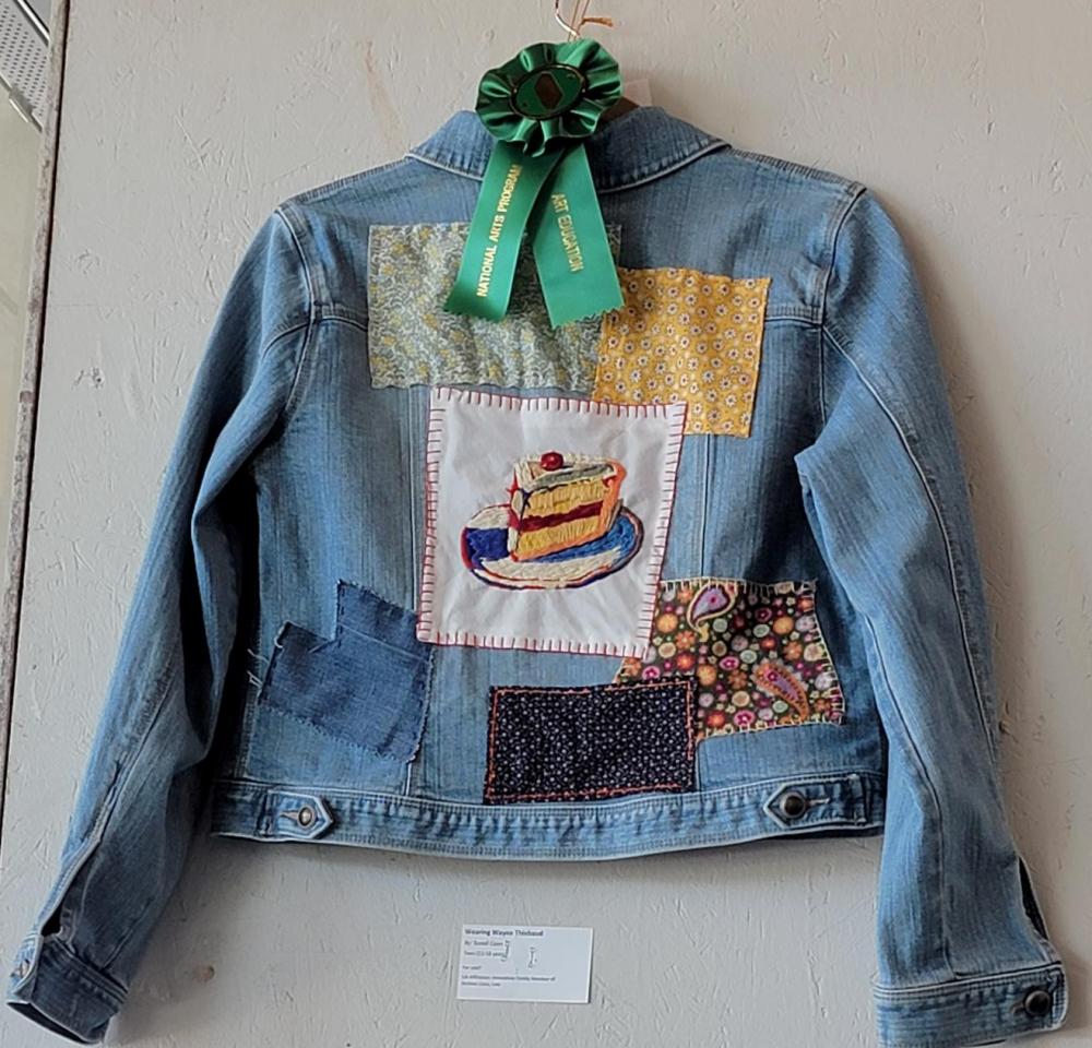 jean jacket with patchwork art education winner