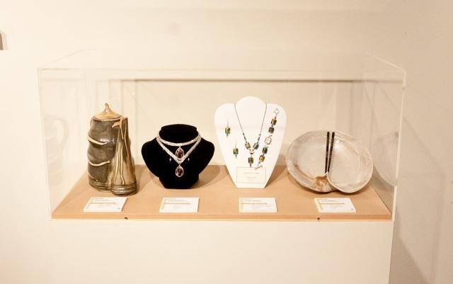 2nd Annual Exhibit Display case featuring three dimensional pieces 