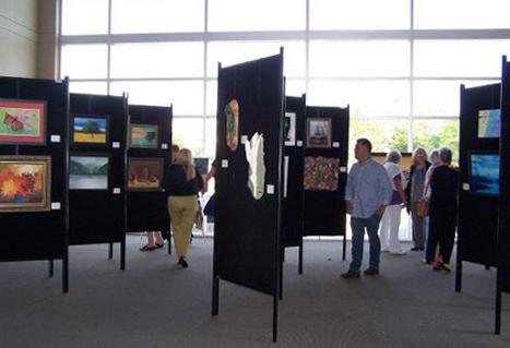 6th Annual Exhibit Attendees taking in the artwork on display for the 6th Annual NAP Exhibition for Central Louisiana Arts & Healthcare