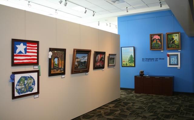 7th Annual Exhibit Employee artwork professionally displayed in the depARTures Gallery of Reno-Tahoe Airport