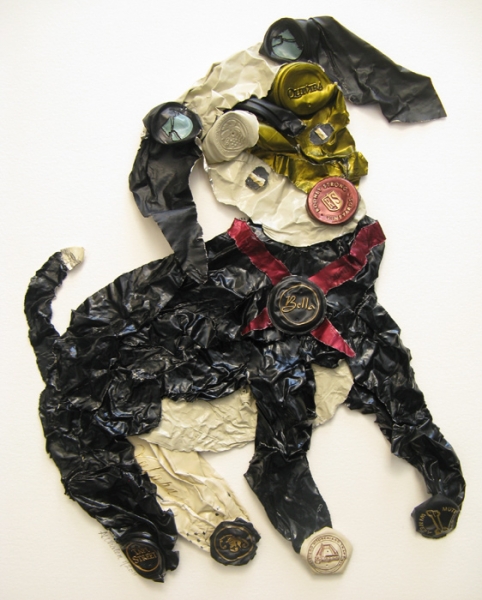 sculpture of a dog created exclusively from wine capsules