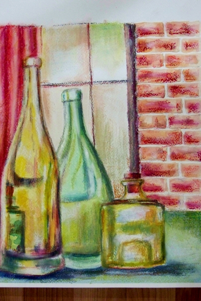 Bottles in a view of window.